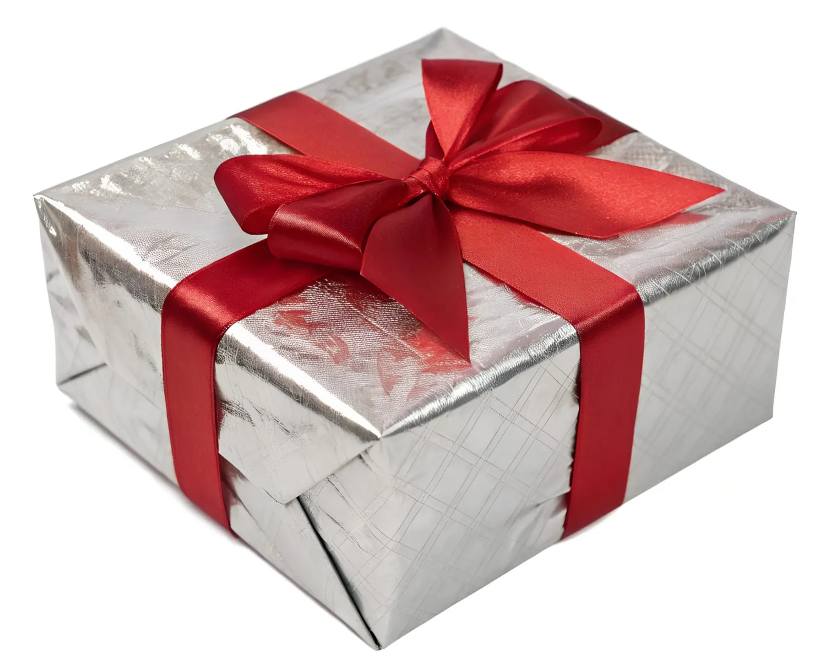 Silver wrapped gift box tied with a red ribbon bow